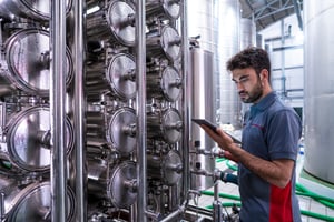 Man on tablet in plantroom